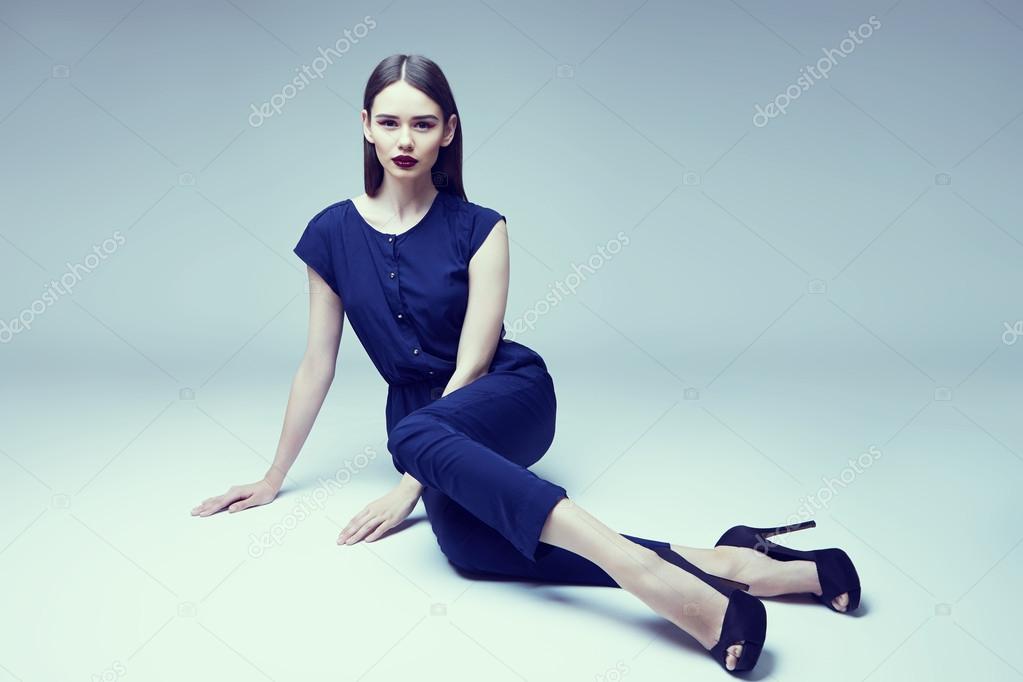 high fashion portrait of young elegant woman. Studio shot
