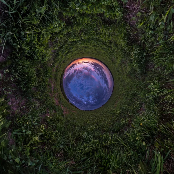 Blue little planet. Inversion of tiny planet transformation of spherical panorama 360 degrees. Spherical abstract aerial view. Curvature of space.