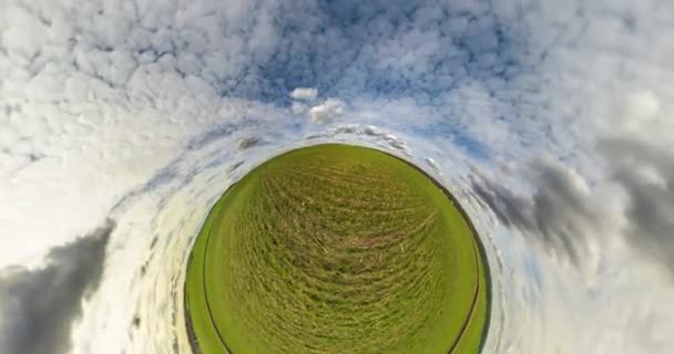 Green Little Planet Revolves Beautiful Blue Sky Evening Clouds Tiny — Stockvideo