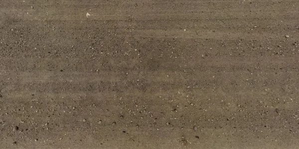 Widok Góry Ślady Opon Samochodowych Powierzchni Żwirowej Drogi — Zdjęcie stockowe
