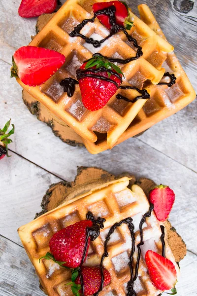 Belgium waffles with strawberries and chocolate. Top view — Stock Photo, Image