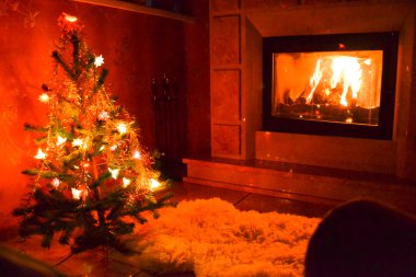 Christmas living room with a fire place clipart