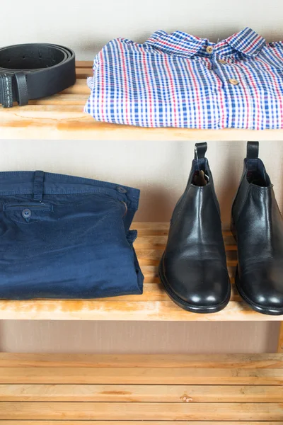 Men's clothes on the shelf — Stock Photo, Image