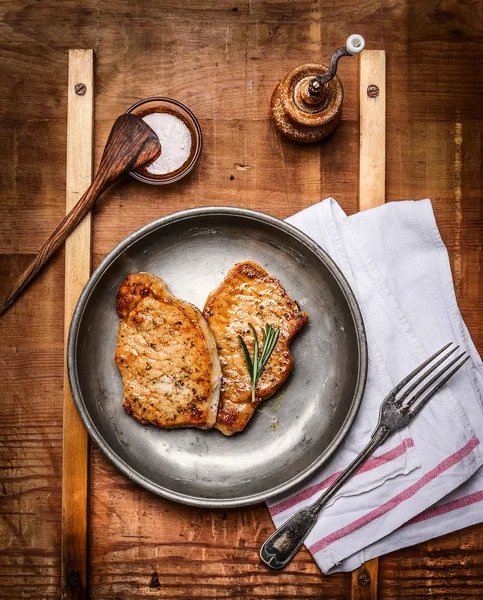 Two roasted pork steaks — Stock Photo, Image