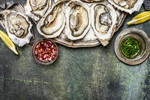 Oysters with lemon and shallots sauce