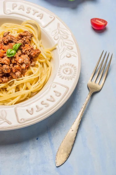 Spaghetti bolognese in white plate — Stock Photo, Image