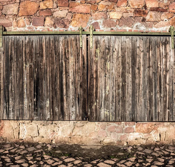 gates on masonry wall