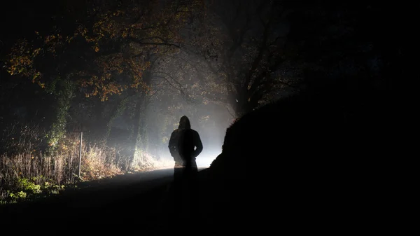 Ghostly Transparent Hooded Figure Silhouetted Glowing Bright Light Country Road — Stock Photo, Image