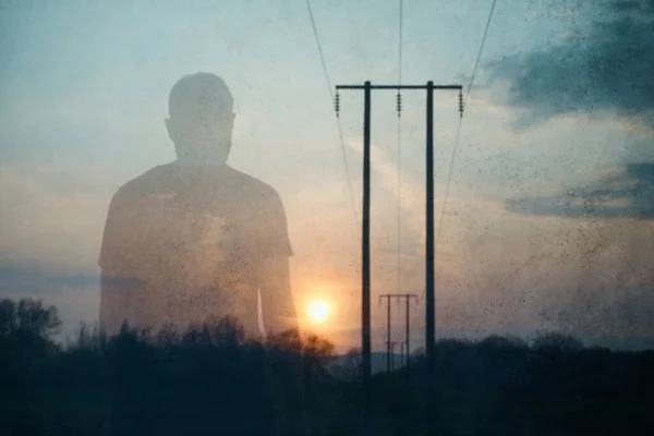 Double Exposure Atmospheric Half Transparent Man Looking Sunset Next Telegraph — Zdjęcie stockowe