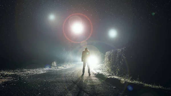 Ufo Concept Glowing Orbs Floating Misty Road Night Silhouetted Figure — Stock fotografie