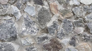 Granit duvar ustası. Granit taşlardan duvar. Eski arkaplan