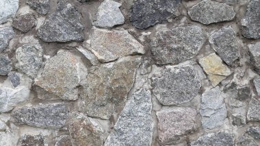 Granit duvar ustası. Granit taşlardan duvar. Eski arkaplan