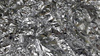 Buruşmuş folyo yüzeyi. Folyo buruşmuş.