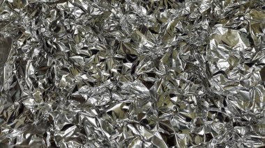 Buruşmuş folyo yüzeyi. Folyo buruşmuş.