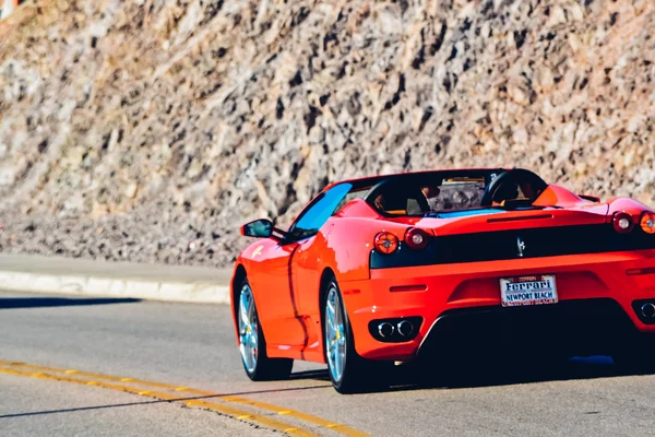 NEVADA, USA - CIRCA 2011: red ferrari on the road in Nevada, USA circa summer 2011. — Stock Fotó