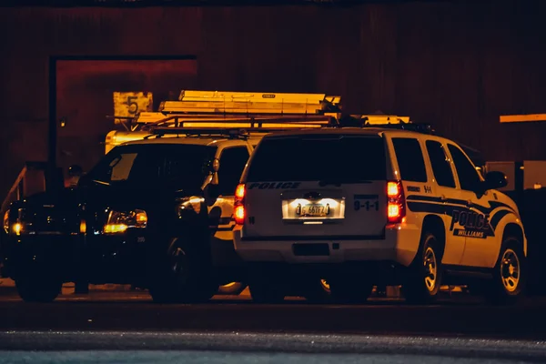 ARIZONA, EE.UU. - CIRCA 2011: coche de policía por la noche en Arizona en septiembre de 2011 en Arizona, EE.UU. . — Foto de Stock