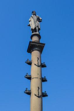 NEW YORK, CIRCA 2014 - The statue of Columbus by Gaetano Russo in the middle of Columbus Circle with blue sky on the background In New York City, NY, USA
