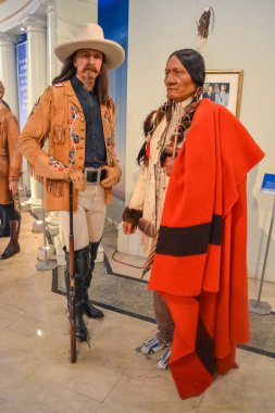 Cowboy and native Red Indian wax figures in Madame Tussaud's museum in New York