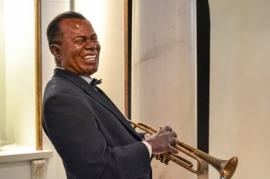 Wax portrait of Louis Armstrong at Madame Tussaud's museum in New York clipart