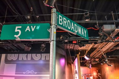 5th ave and Broadway street sign in Madame Tussaud's museum in New York