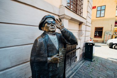 STOCKHOLM, SWEDEN - CIRCA JULY 2014: statue of Evert Taube at Jarntorget in Stockholm, Sweden circa July 2014.
