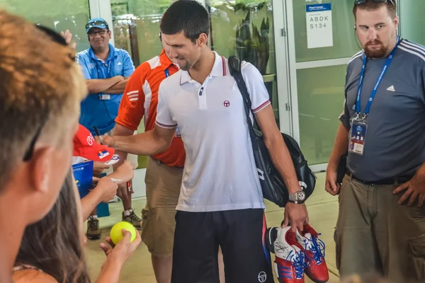 CINCINNATI, OH - CIRCA 2011: a crowd greets Novak Djokovic at Lindner Family Tennis Center on after finals at Western & Southern Open tournament in Cincinnati, OH, USA at summer 2011. — Stock Photo, Image