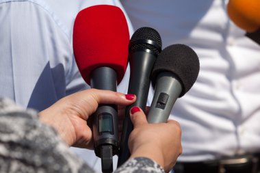 Media interview. Microphones. clipart