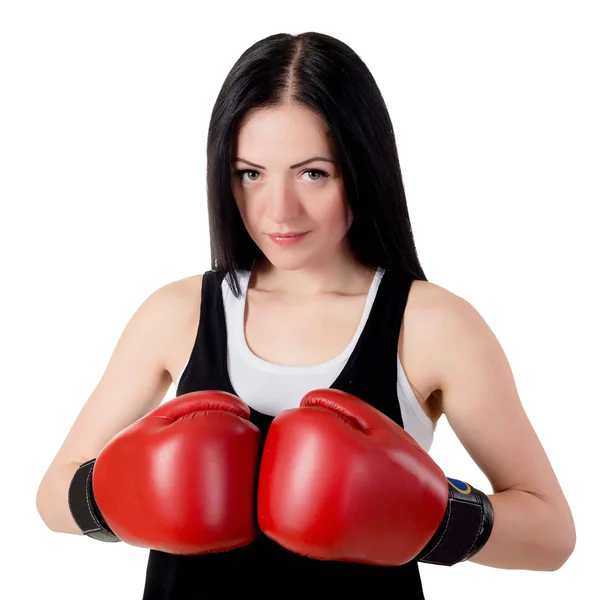Portret van een mooie jonge brunette vrouw met rode boksen glo — Stockfoto