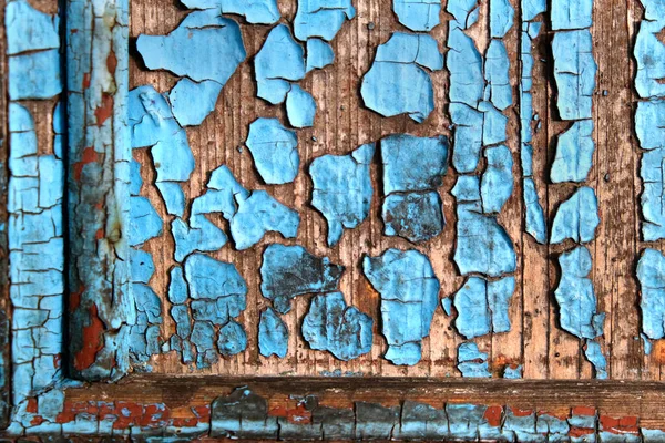 古い木の壁の質感と剥がれた青の塗料の抽象的な背景 — ストック写真