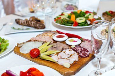 cold cuts on a banquet table