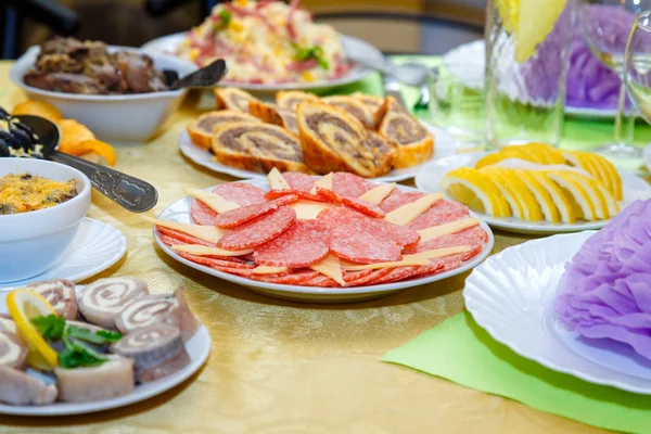 Cold cuts at the banquet table — Stock Photo, Image