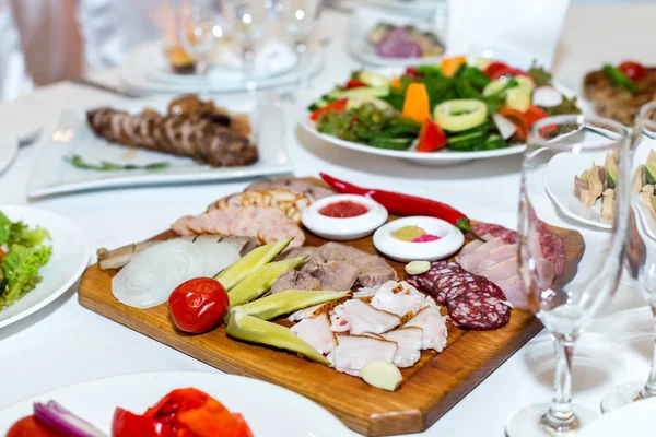 Cold cuts on a banquet table — Stock fotografie