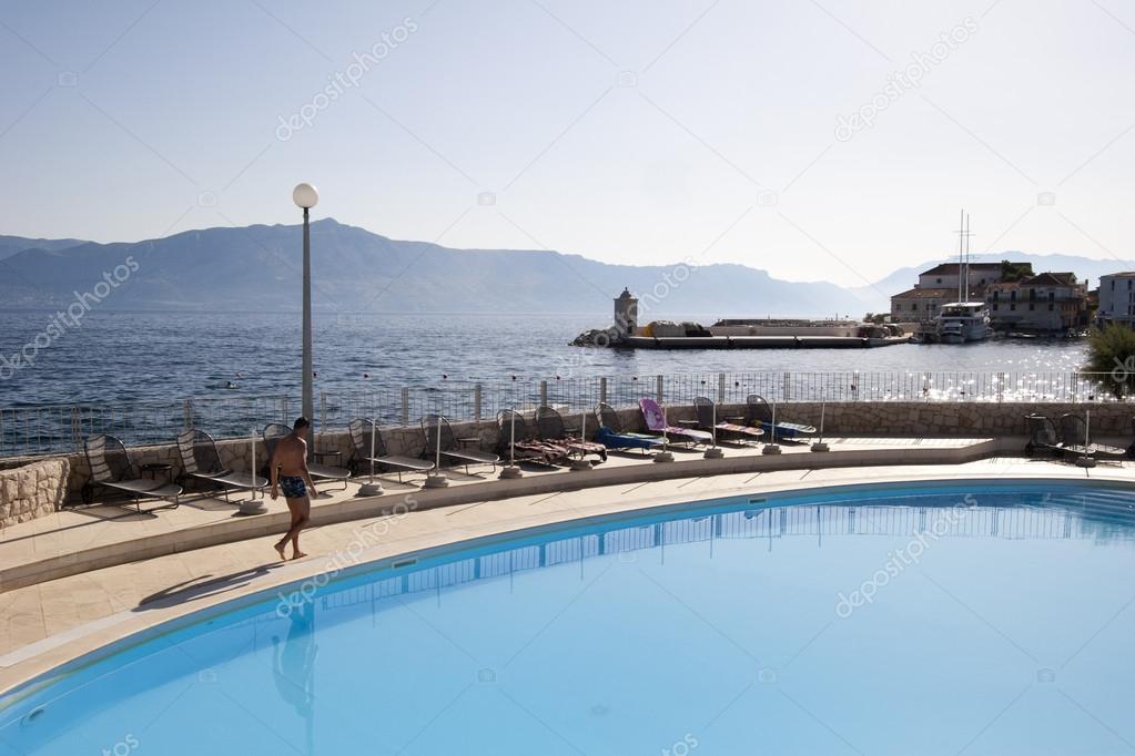 Turquoise blue water in swimming pool