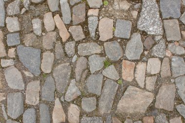 Eski taş kaldırım sokak. Ayrıntı tarihi granit döşeme.