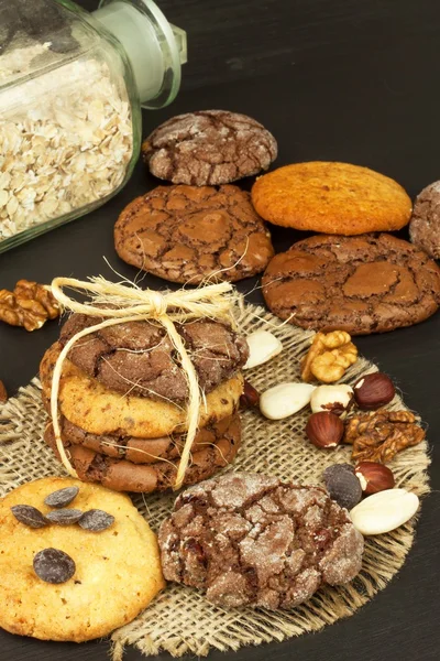 Mixed Cookies on wooden table. Homemade biscuits for breakfast. Food preparation. — Stock Photo, Image