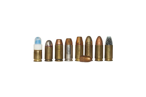 Shot and bullets caliber 9mm, different types, isolated on white — Stock Photo, Image