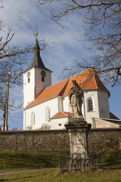 Tipical Czech village church in "Dolni Loucky", built in the second half of the 13th century, early Gothic building, St. Martin 's Church — стоковое фото