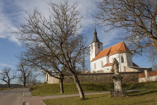 Tipical Czech village church in "Dolni Loucky", built in the second half of the 13th century, early Gothic building, St. Martin 's Church — стоковое фото