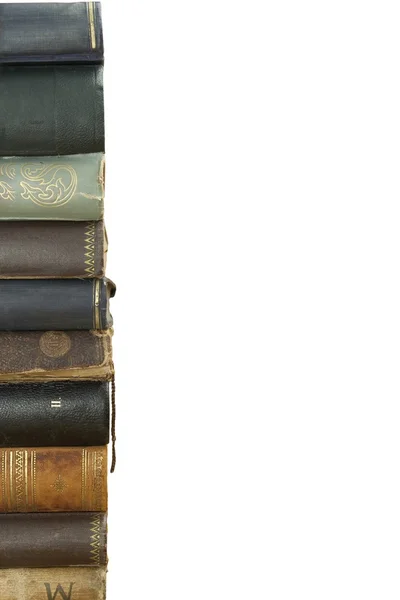 Front view of old books stacked on a shelf. Books without title and author. Isolated on white background, place for your text. — Stock Photo, Image