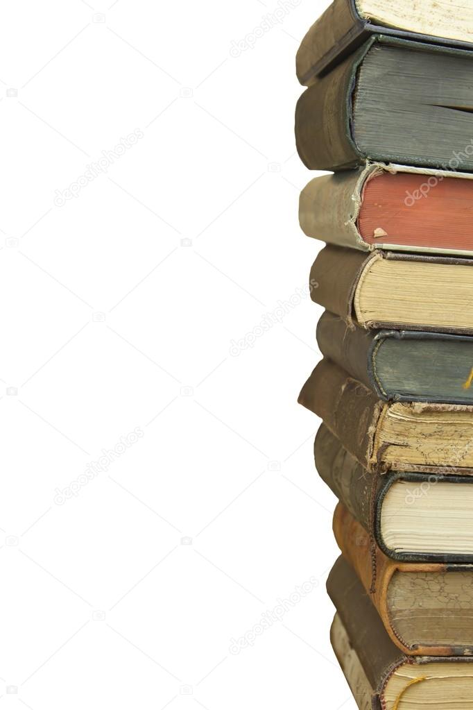 Front view of old books stacked on a shelf. Books without title and author. Isolated on white background, place for your text.