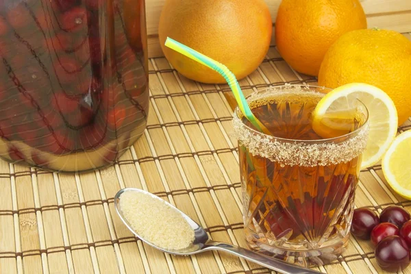 Glasses with cherries with rum. Preparing for summer refreshment cocktail. Cane rum and sugar. Sour pickled in rum. — Stock Photo, Image