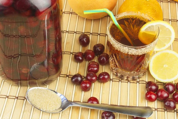 Glasses with cherries with rum. Preparing for summer refreshment cocktail. Cane rum and sugar. Sour pickled in rum. — Stock Photo, Image