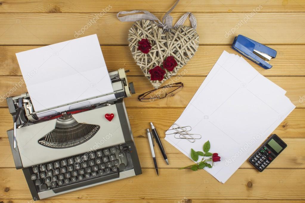 The writer writes a romance novel. A love letter for Valentine's Day. Declaration of love written on paper. Love in words and letters. Heart written declaration of love.