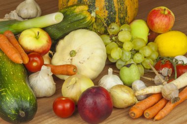 Fresh organic fruits and vegetables from local farms. Diet raw food ready to eat. Fruit and vegetables on the farm. clipart