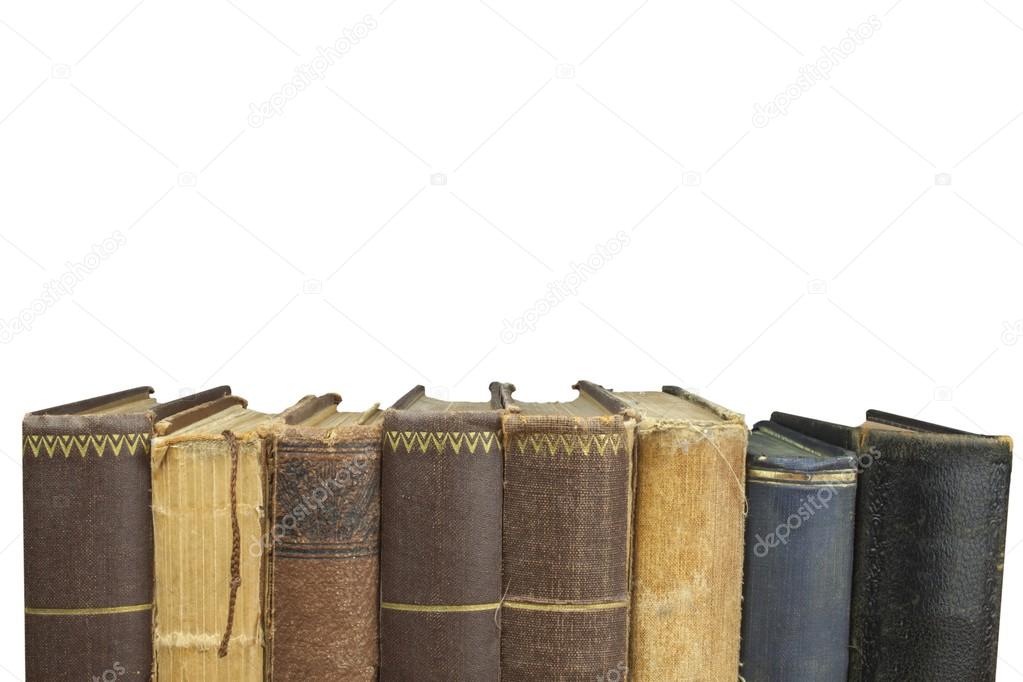 Front view of old books stacked on a shelf. Books without title and author. Isolated on white background, place for your text.