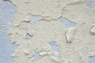 Eski duvar detay arka plan doku için metin veya resim kırık. Arka plan, eski kırık alçı duvar, mavi doku, boya lekeleri ve çatlaklar. Hava açık cephe üzerinde etkisi. Eski boya