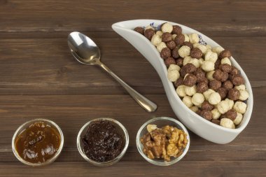 Healthy Diet breakfast of oatmeal, cereal and fruit. Foods full of energy for athletes. The concept of diet food. Preparing homemade breakfast. Vegetarian diet.