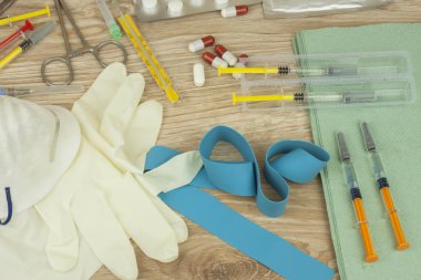 Vaccination against influenza epidemic. Syringe and Sterile Vial Filled with Medication Solution. An Injection Pharmaceutical Dosage Form.