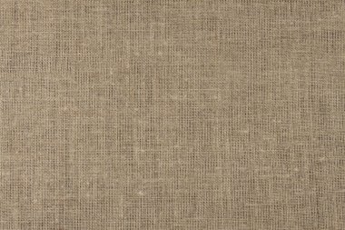 Linen tablecloth. Texture sack sacking country background. Brown canvas background. Light natural linen texture for the background.