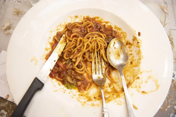 food waste plate with spaghetti - Plate after eating food, dirty dishes